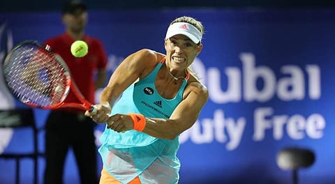 Angelique Kerber of Germany returns the ball to Elina Svitolina of Ukraine during their third semi final women's WTA Tennis Championship in Dubai. | AFP