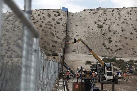 A tall fence in the Mexico-US border area separating the towns of Anapra, Mexico and Sunland Park. (File photo | AP)