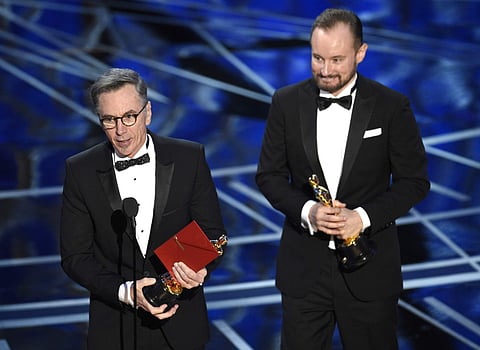 Kevin O'Connell, left, and Andy Wright accept the award for best sound mixing for 'Hacksaw Ridge' at the Oscars on Sunday, Feb. 26, 2017, at the Dolby Theatre in Los Angeles. (Photo | AP)