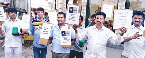 Cab drivers take out a protest in the city for the sixth day on Sunday. The drivers went around the city collecting alms at traffic signals to collect enough money so that they can ‘bribe’ the government