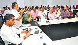 GVMC commissioner M Hari Narayanan (sitting) addressing the members of Resident Welfare Associations in Visakhapatnam on Sunday | Express