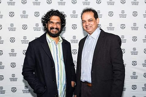 Director  Sanal Kumar Sasidharan (Left)(Photo via IFFR twitter Handle)