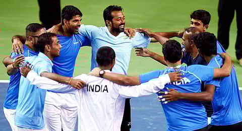 Indian team players celebrate after their victory over New Zealand in a Davis Cup tennis match in Pune on Sunday. | PTI