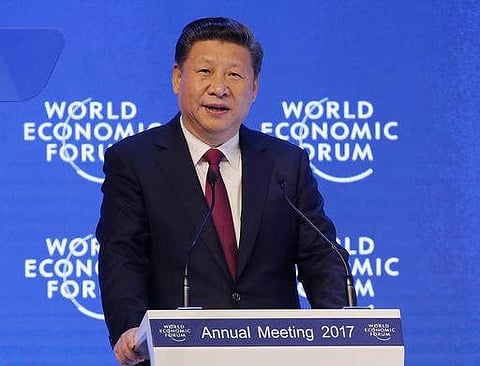 Wary US and China pledge respect at first Trump-era meet
