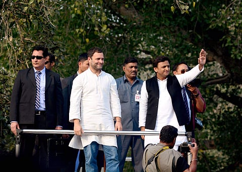 Congress leader Rahul Gandhi and SP president Akhilesh Yadav during a road show in Agra. | PTI File Photo