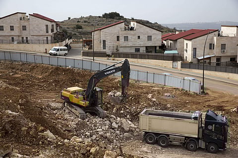 Heavy machinery work at a construction site in the West Bank Jewish settlement of Ariel, Jan 25, 2017. ( File Photo | AP )