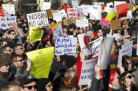 Protesters and immigrants' rights' advocates rally in opposition to President Donald Trump's immigration order at Battery Park in New York. (File Photo | AP)