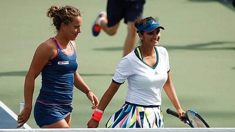 Sania Mirza (R) and doubles partner Barbora Strycova. | AP File Photo