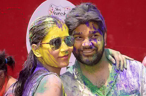 Bollywood actors have fun with colours at a holi gathering. (Arun Jetlie | EPS)