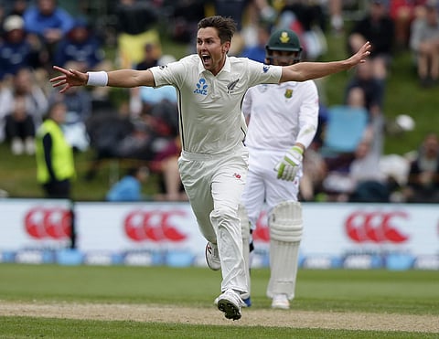 New Zealand's Trent Boult celebrates after dismissing South Africa's Stephen Cook for no score during the first cricket test at University Oval, Dunedin, New Zealand, Friday, March 10, 2017. | AP