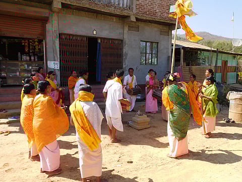 Vaishnava singers sing traditional songs praising Lord Krishna around a tulsi plant in a Meitei house near Imphal in Manipur on Friday. | Aishik Chanda