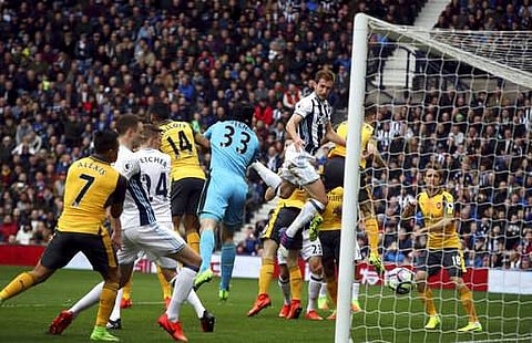 West Bromwich Albion's Craig Dawson scores his side's first goal of the game, during the English Premier League soccer match between West Bromwich Albion and Arsenal on Saturday. (Photo | AP)