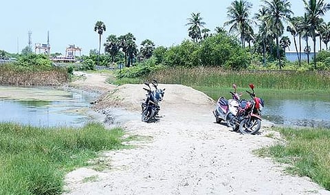 The illegal mud road that was laid across the Muttukadu lagoon | Express Photo Service