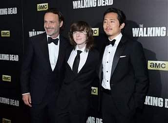 Andrew Lincoln, from left, Chandler Riggs and Steven Yeun attend AMC's 'The Walking Dead' season six premiere fan event at Madison Square Garden. (File Photo | AP)