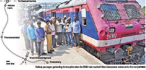 Railway passengers garlanding the loco pilot when the DEMU train reached Vellore Cantonment station on its first run | Express