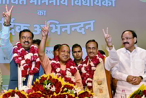 UP CM Candidate Yogi Adityanath, his deputies along with BJP Leader Venkaiah Naidu. (Photo | PTI)