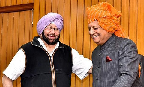 Punjab Chief Minister Captain Amarinder Singh with Rana Kanwarpal Singh after he took oath as Speaker of State Assembly at Raj Bhawan in Chandigarh. (PTI)