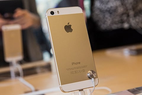 The gold version of the iPhone 5S is displayed at an Apple store on September 20, 2013 | AFP