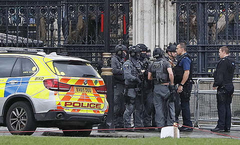 Officer stabbed at UK Parliament; report of car rampage
