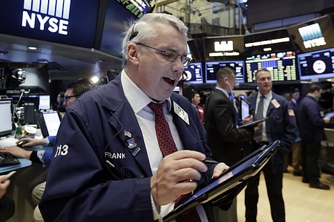 Trader Frank O'Connell works on the floor of the New York Stock Exchange, March 16, 2017.  AP