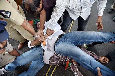 Raising slogans against the government, the BJP members demanded that the government drop the proposal to increase the quota for the Muslims. (EPS | Satish Babu)