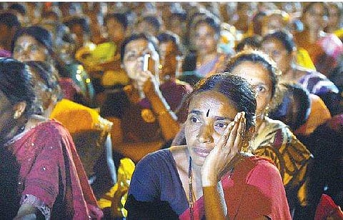 A visibly upset anganwadi worker.