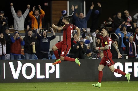 United States' Clint Dempsey, center, celebrates his free-kick goal with teammate Geoff Cameron, right, during the second half of a World Cup qualifying soccer match against Honduras on Friday, March 24, 2017, in San Jose, Calif. | AP