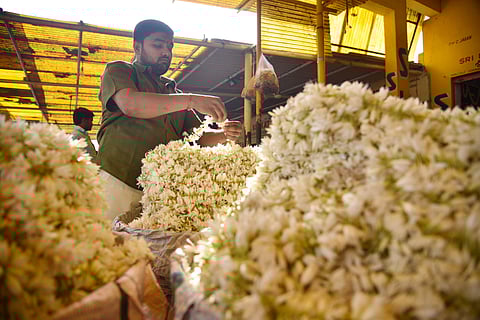 Flowers arriving Ahead of Ugadhi festival at Gudimalkapur wholesale flower market, in Hyderabad on saturday. (R Satish Babu | EPS)