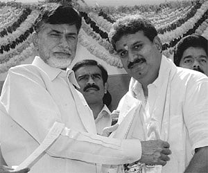 MP Kesineni Nani (right) along with MLA Bonda Uma Maheswar Rao and MLC Buddha Venkanna went to meet the deputy transport commissioner Bala Subramanyam.