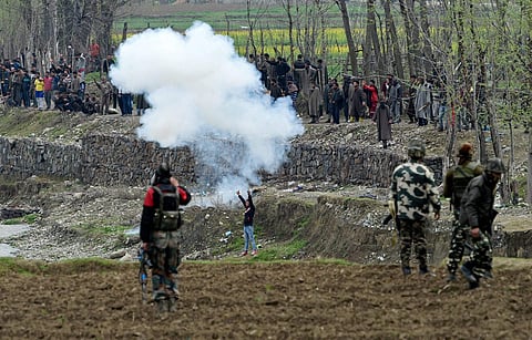 Local protesters try to disrupt an anti-militant operation at village Durbugh in Chadoora area of central Kashmir's Budgam district on Tuesday. One militant and three civilians were killed in the operation.(Photo | PTI)
