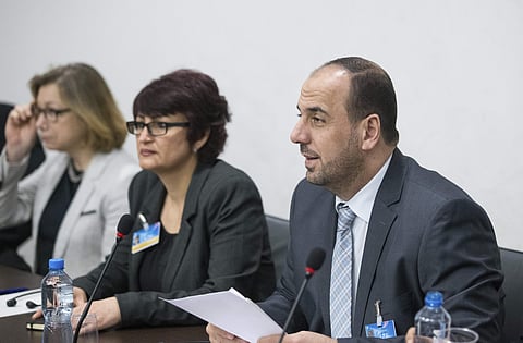 Syria's opposition delegation leader Nasr al-Hariri, right, attends a meeting of Intra-Syria peace talks with UN Special Envoy for Syria Staffan de Mistura at Palais des Nations in Geneva . (Photo | AP)