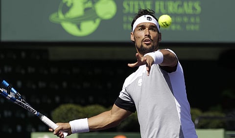 Fabio Fognini, of Italy, returns the ball to Kei Nishikori, of Japan, during the Miami Open tennis tournament, Wednesday, March 29, 2017, in Key Biscayne, Fla.  | AP