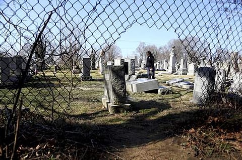 Volunteers are expected to help in an organized effort to clean up and restore the Jewish cemetery where vandals damaged hundreds of headstones.(Photo | AP)