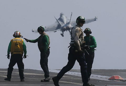 A U.S. Navy F18 fighter jet from the U.S. Navy aircraft carrier USS Carl Vinson (CVN 70) for a patrol off the disputed South China Sea Friday, March 3, 2017. (File Photo | AP)