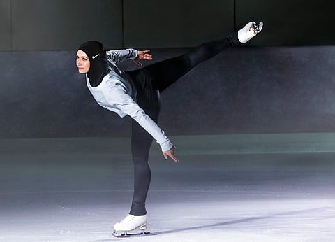 In this undated image provided by Nike, figure skater Zahra Lari model wears Nike's new hijab for Muslim female athletes. | AP