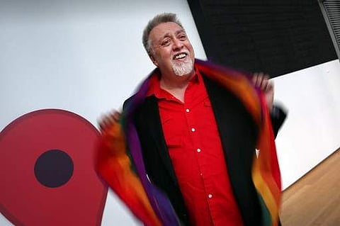 This January 06, 2016 image shows Rainbow Flag Creator Gilbert Baker at the Museum of Modern Art (MoMA) in New York City. (File Photo | AFP)