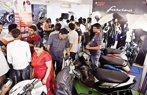 People crowding a two-wheeler showroom due to huge discount of BS-3 vehicles in Hyderabad on Friday | R Satish Babu