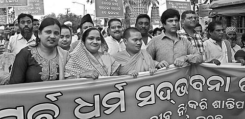 Members of BJD Minority cell taking out a peace rally over Bhadrak riots in Bhubaneswar on Tuesday  | Express