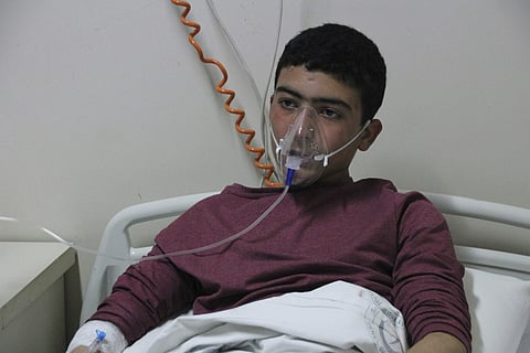 A victim of chemical weapons attacks in Syrian city of Idlib, at a local hospital in Reyhanli. (File photo | AP)