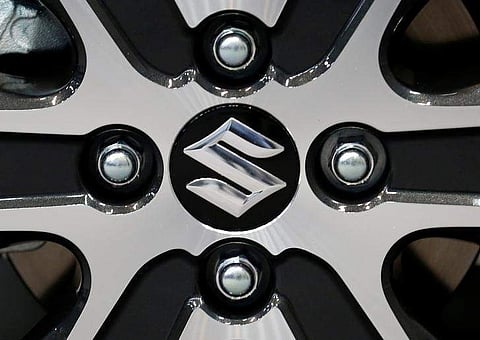 Suzuki Motor's logo on a wheel of its Wagon R Stingray is pictured at its launch event in Tokyo in February. (File Photo | Reuters)