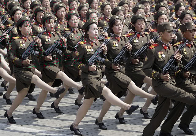 North Korean women soldiers march across Kim Il Sung Square during the military parade. | AP