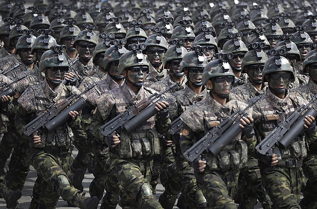 North Korean commandoes march across the Kim Il Sung Square during the military parade. | AP