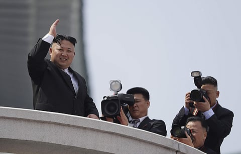 North Korean leader Kim Jong Un waves during a military parade on Saturday, April 15, 2017, in Pyongyang, North Korea to celebrate the 105th birth anniversary of Kim Il Sung, the country's late founder and grandfather of current ruler Kim Jong Un. | AP