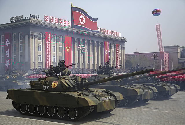 Missiles are paraded across Kim Il Sung Square during the military parade. | AP