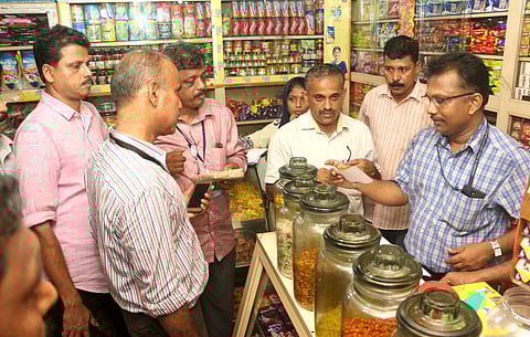 Food Safety officers conducting inspection at a bakery at Kozhikode  mofussil bus stand following the death of a boy allegedly due to food poisoning | T P Sooraj