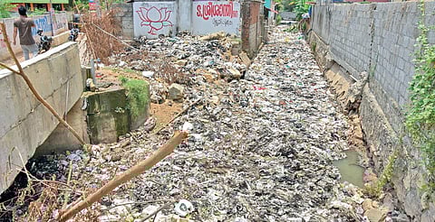 The Amayizhanjan canal heavily clogged with waste at the Mosque Lane stretch  B P Deepu