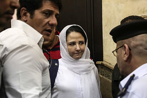 Aya Hijazi, center, a dual U.S.-Egyptian citizen, is acquitted by an Egyptian court after nearly three years of detention. (AP)