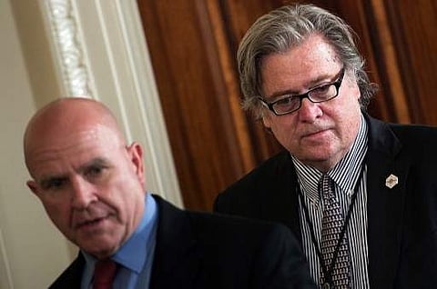 National security advisor H.R. McMaster (L) and strategist Steve Bannon arrive for a joint press conference with US President Donald Trump and NATO Secretary General Jens Stoltenberg in the East Room at the White House in Washington, DC, on April 12, 2017