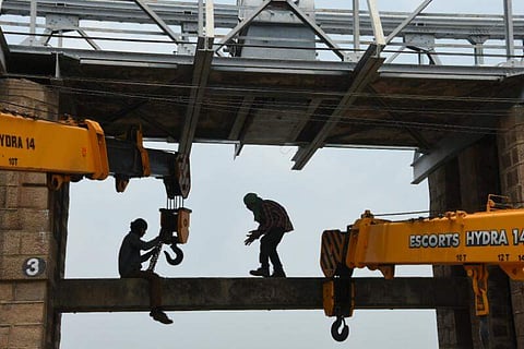 Irrigation department has taken up the repair work of Prakasam Barrage in Vijayawada on Monday. (R V K Rao | EPS)