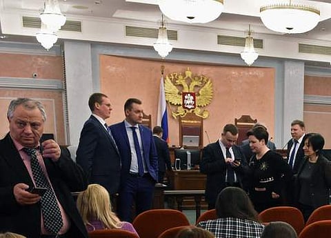 Participants attend a hearing on the justice ministry request to ban the Jehovah's Witnesses at Russia's Supreme Court in Moscow on April 20, 2017. Russia's Supreme Court issued a ruling banning Jehovah's Witnesses after finding the group to be extremist.